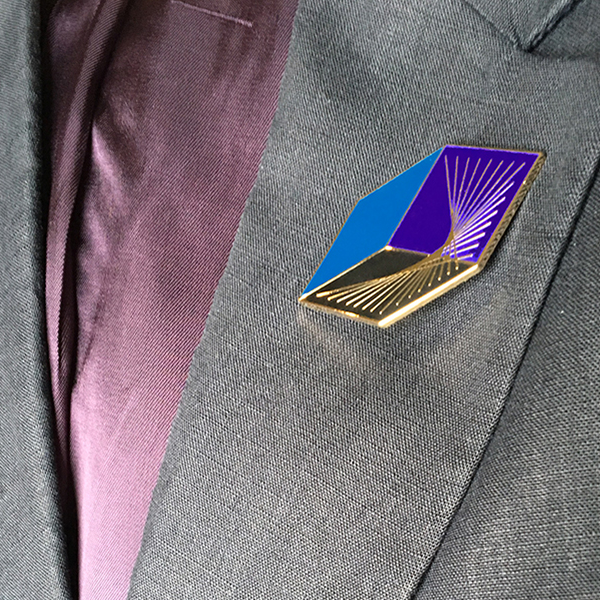 Bezier lapel pin on suit jacket