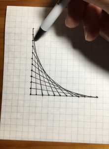 drawing on a Bezier curve showing lines on graph paper, pen, hand