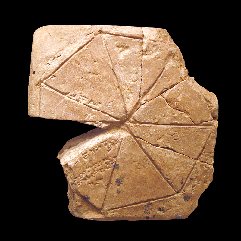 heptagon and cuneiform numbers inscribed on ancient clay tablet